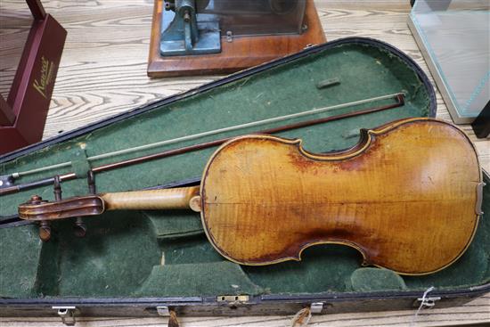 A 19th century violin, two piece back, cased with a later bow